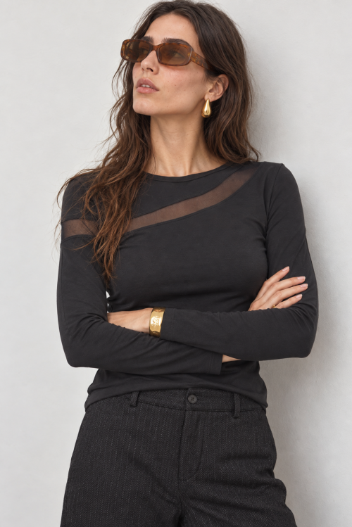 Aloof Editorial Portrait in Gold and Black