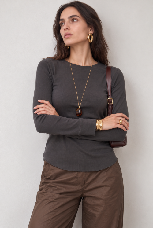 Contemplative Editorial Portrait with Gold Accents