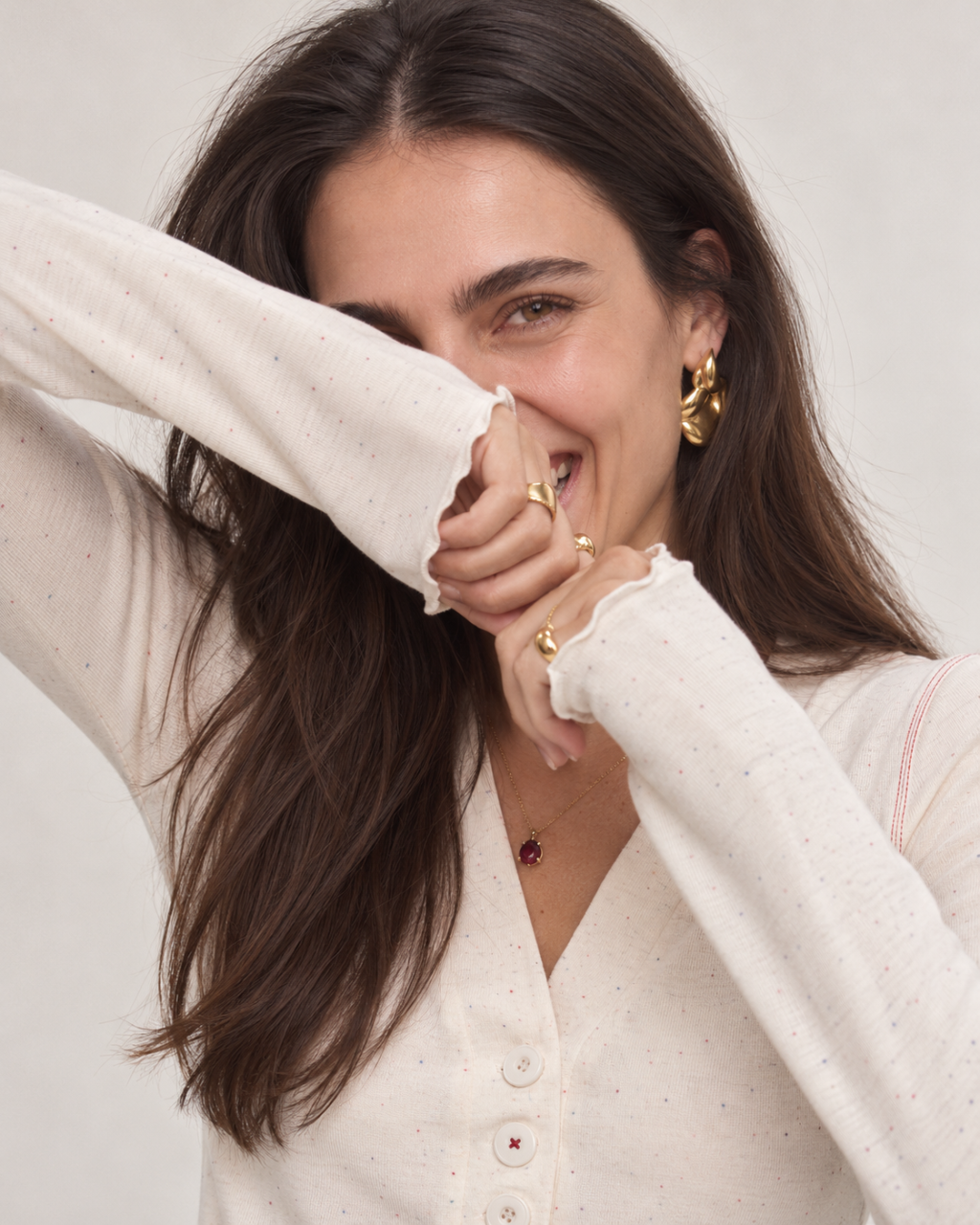 Playful Laugh in Gold and Cream