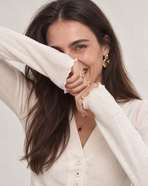 Playful Laugh in Gold and Cream