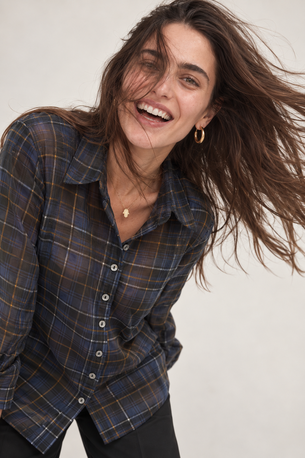 Windblown Joy in a Plaid Shirt